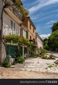 Rustic houses and homes in the coastal town of Novigrad in Croatia. Rustic homes in Croatian town of Novigrad in Istria County