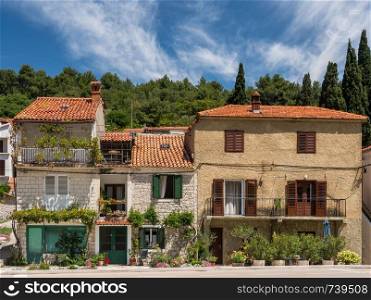 Rustic houses and homes in the coastal town of Novigrad in Croatia. Rustic homes in Croatian town of Novigrad in Istria County