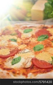 rustic italian pizza with mozzarella cheese tomato and basil leaves. pizza margarita