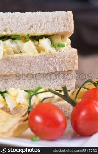 Rustic kitchen setting for fresh egg sandwich