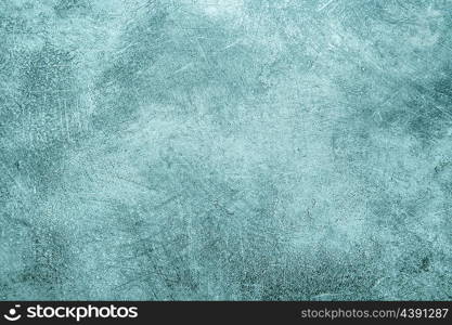 Rustic scratched blue stone texture. Vintage style toned background