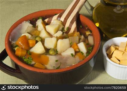 rustic soup with mixed vegetables and pumpkin