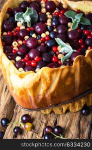 rustic summer pie with berries. rustic summer pie with cherry, currant and raspberry