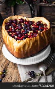 rustic summer pie with berries. rustic summer pie with cherry, currant and raspberry