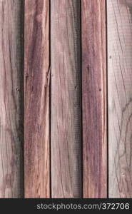 Rustic weathered barn wood background with knots and nail holes