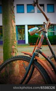 Rusty bike front wheel closeup