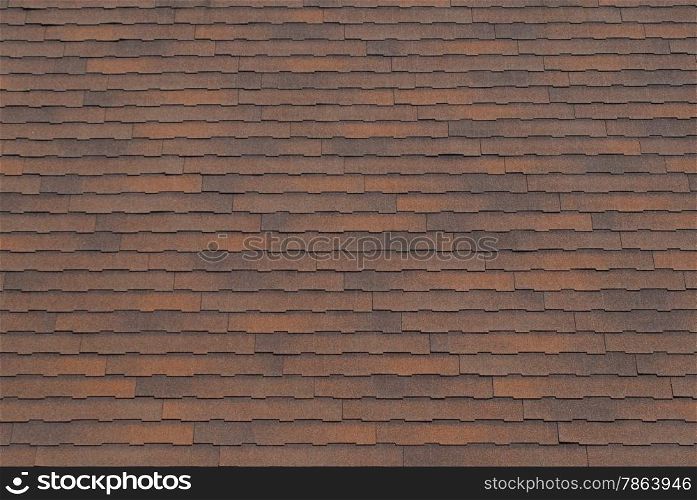 Rusty brown roof shingle texture background.