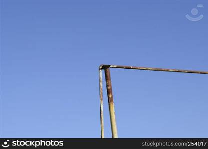 Rusty gas pipe against the blue sky.. Rusty gas pipe against the blue sky