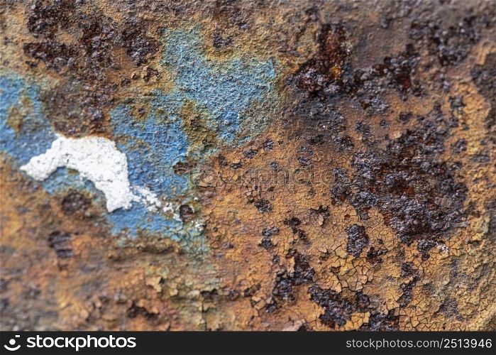 rusty metal surface with paint peel