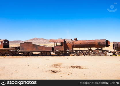 Rusty old steam train at the Train Cemetery, Salar de Uyuni, Bolivia