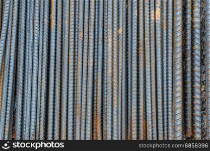 Rusty rebar steel used in construction background texture
