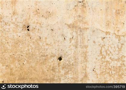 Rusty stone concrete surface in tan color, detailed natural texture.