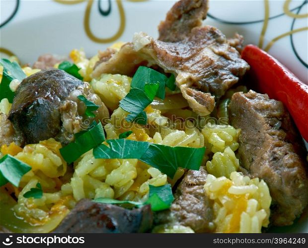 Ruzz bil Khaloot - Libyan rice with liver and almonds.African cuisine