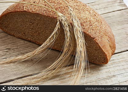 rye bread, and corn on the wooden table