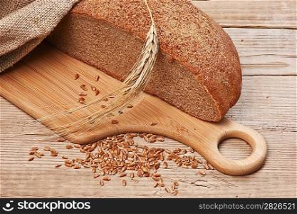 rye bread, and corn on the wooden table