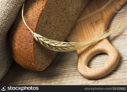 rye bread and corn on the wooden table