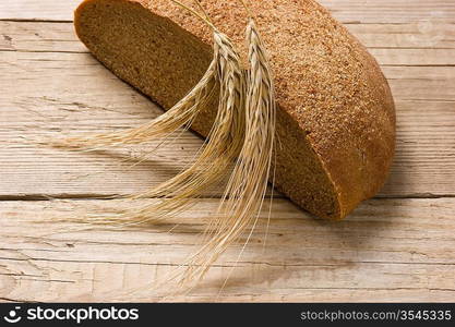 rye bread, and corn on the wooden table