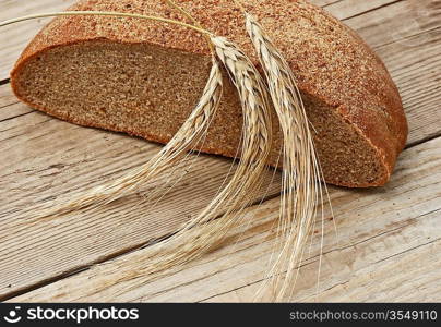 rye bread, and corn on the wooden table