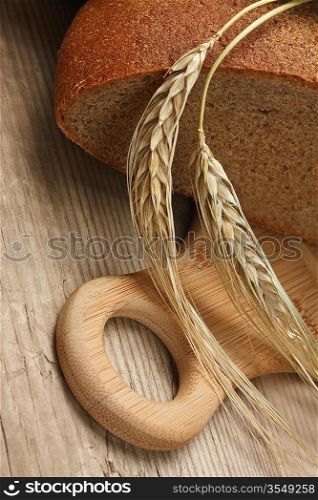 rye bread and corn on the wooden table