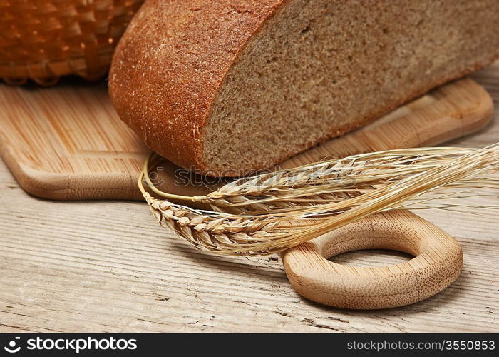 rye bread, and corn on the wooden table