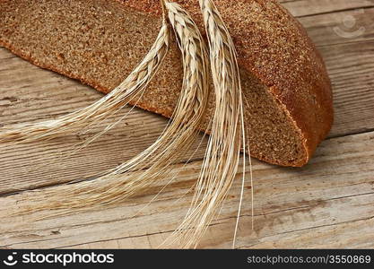 rye bread, and corn on the wooden table