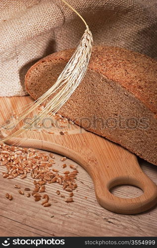 rye bread, and corn on the wooden table