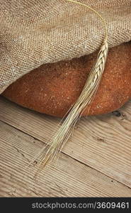 rye bread, and corn on the wooden table