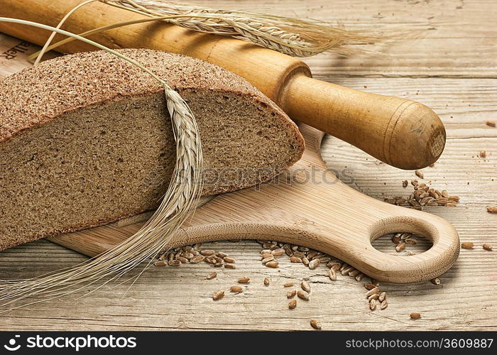 rye bread, and corn on the wooden table