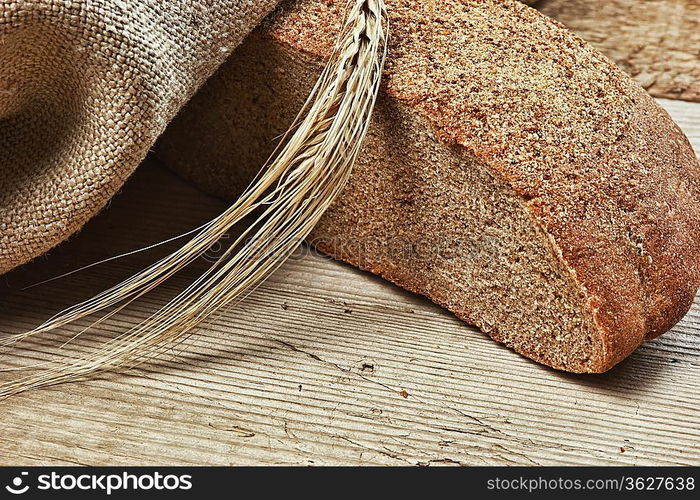 rye bread, and corn on the wooden table