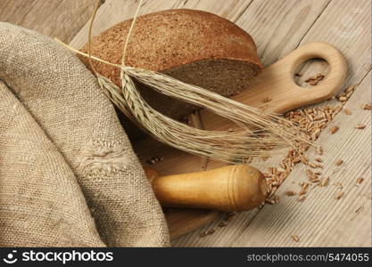 rye bread, and corn on the wooden table