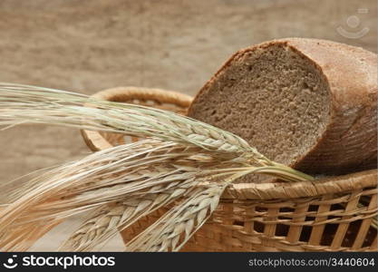 rye bread and ears of corn in the basket