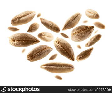 Rye grains in the shape of a heart on a white background.. Rye grains in the shape of a heart on a white background