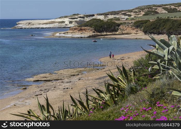 S'Archittu is a small coastal town near Oristano on the west coast of Sardinia, Italy. The town takes its name from the nearby natural arch (S'Archittu or little arch).
