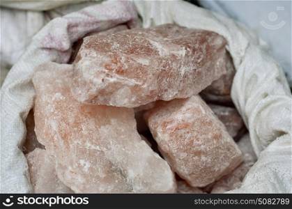 Sack of pink salt for sale at the market