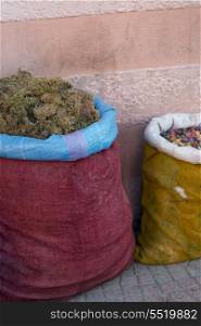 Sacks of food for sale at market stall, Medina, Marrakesh, Morocco