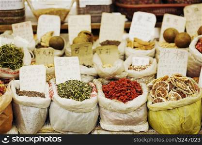Sacks of herbs and spices at a market stall, Tai&acute;an, Shandong Province, China