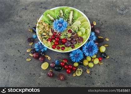 Sacks with red goji, buckwheat, Jerusalem pea, mulberry, kidney bean isolated over grey background with copy space for your information