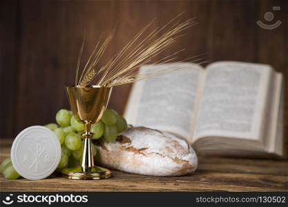Sacrament of communion, Eucharist symbol . Eucharist symbol of bread and wine, chalice and host, First communion background