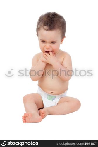 Sad baby with sore gums crying isolated on a white background