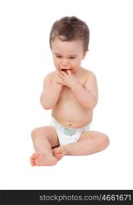 Sad baby with sore gums crying isolated on a white background
