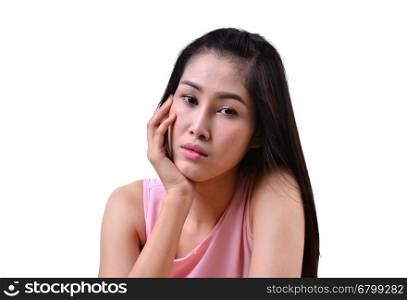 Sad beautiful woman standing against a white background