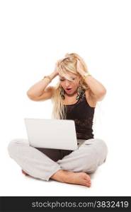 sad blonde woman sitting on the floor with notebook over white isolated background