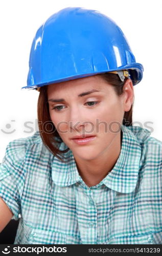 Sad female builder