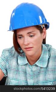 Sad female builder