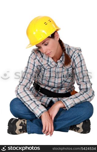 Sad female builder