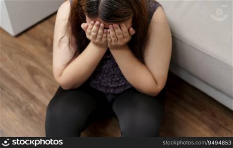 Sad Overweight plus size woman thinking about problems on sofa upset girl feeling lonely and sad from bad relationship or Depressed woman disorder mental health.