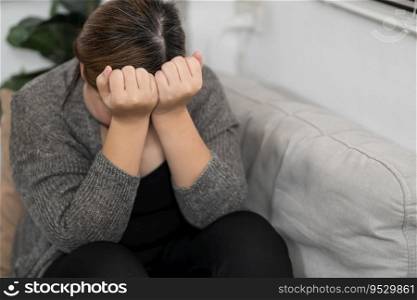 Sad Overweight plus size woman thinking about problems on sofa upset girl feeling lonely and sad from bad relationship or Depressed woman disorder mental health