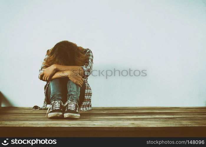 Sad woman hug her knee,nobody