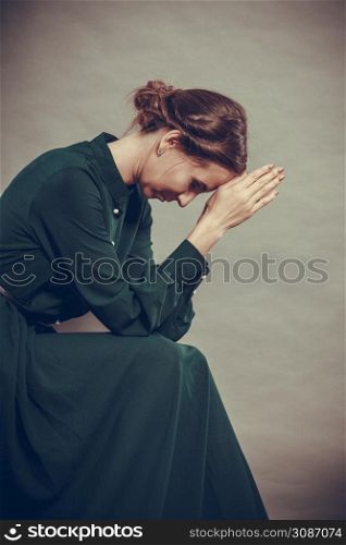 Sad woman retro style portrait long dark gown, vintage photo