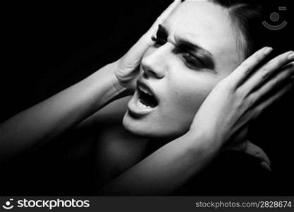 Sad woman yelling - migraine. Depression, stress